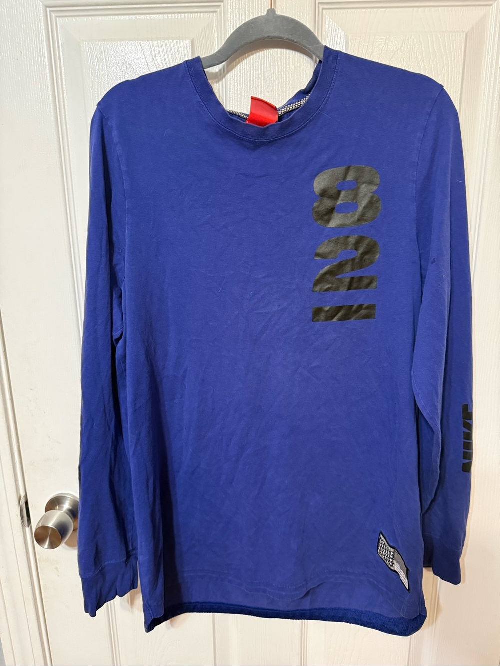 Nike Men's Royal Blue Long-Sleeve Graphic Tee with Black Accents